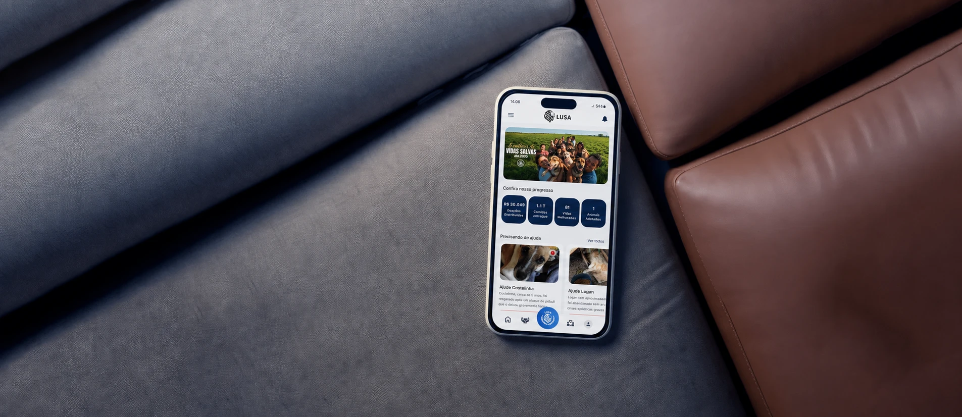Smartphone showing the LUSA app on a leather sofa